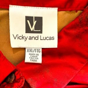 Red multicolored pant suit, beautiful satin feel, cropped pants.